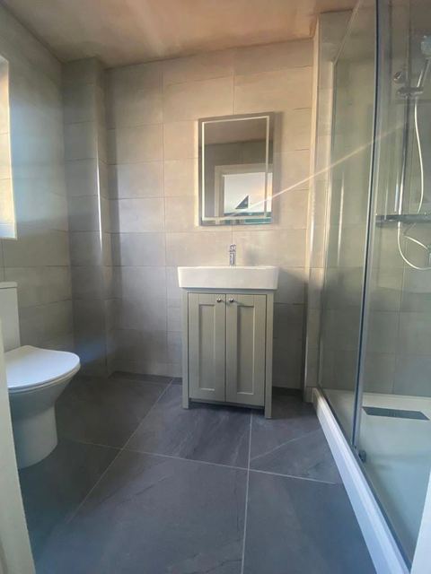 An elegant bathroom, and a second job for the same family — finished