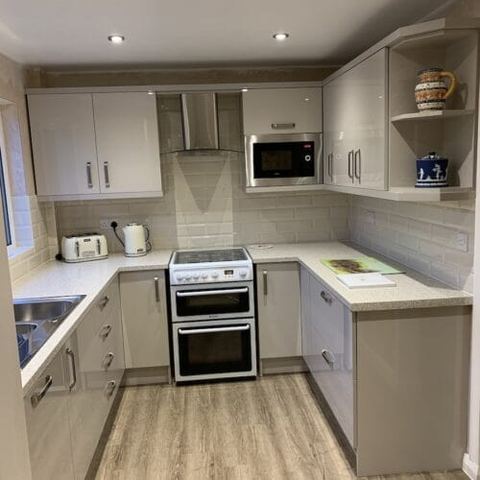 Cashmere Gloss kitchen with integrated storage — finished
