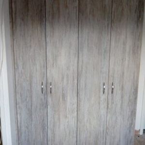 Bespoke fitted bedroom in Dark Artwood — finished