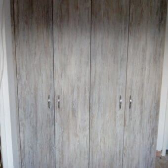 Bespoke fitted bedroom in Dark Artwood — finished