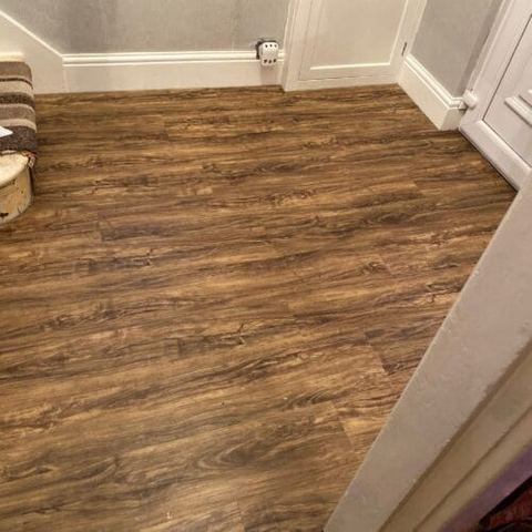Sliding wardrobes and vinyl click flooring — finished