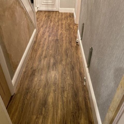 Sliding wardrobes and vinyl click flooring — finished