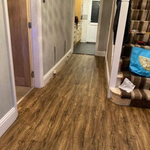 Sliding wardrobes and vinyl click flooring — finished