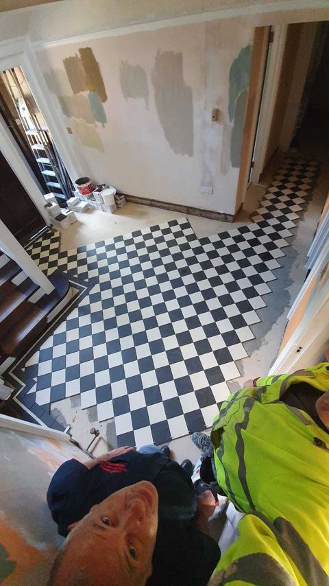 Victorian-style floor tiling laid on the diagonal — finished