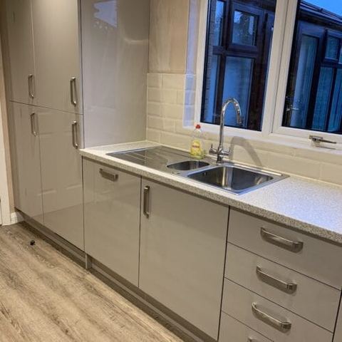 Cashmere Gloss kitchen with integrated storage — finished