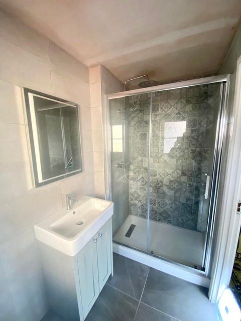 An elegant bathroom, and a second job for the same family — finished