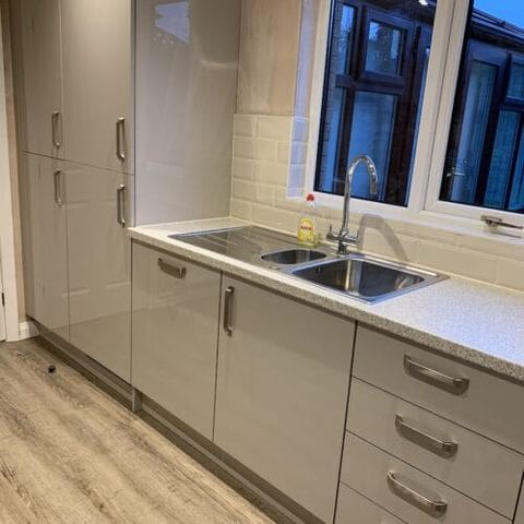 Cashmere Gloss kitchen with integrated storage — finished