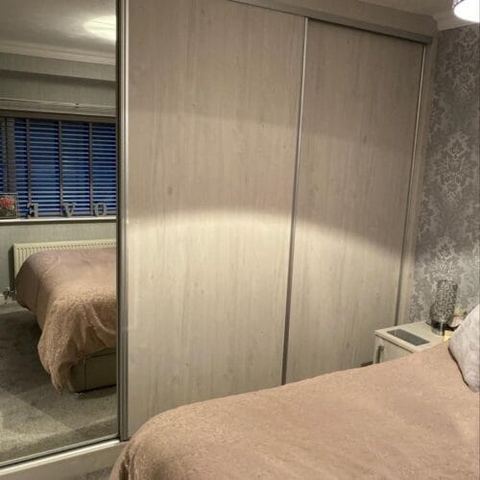 Sliding wardrobes and vinyl click flooring — finished