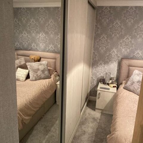 Sliding wardrobes and vinyl click flooring — finished
