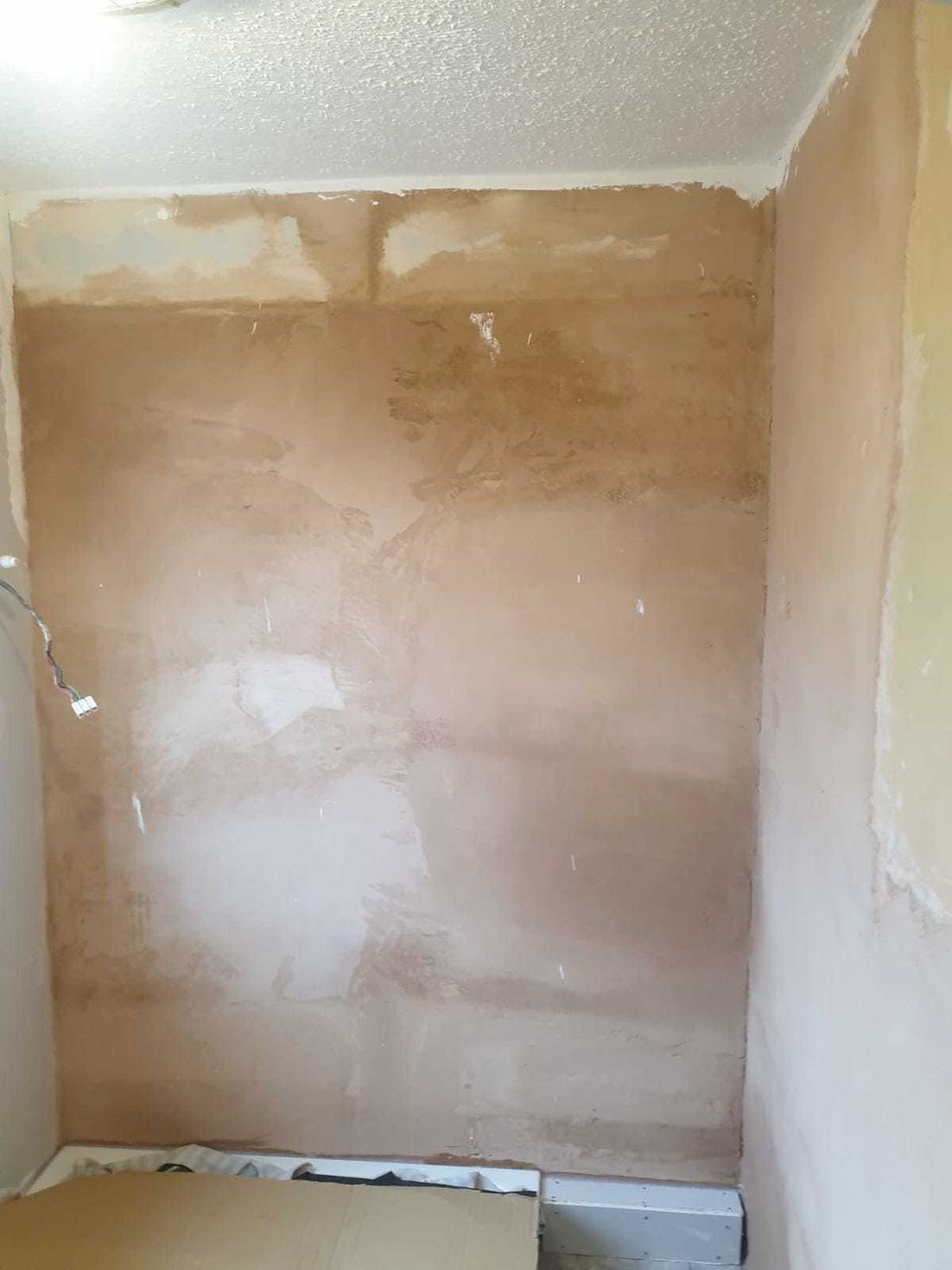 White ceramic tiling to lift a small bathroom — before work started