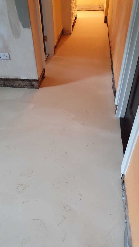 Victorian-style floor tiling laid on the diagonal — finished