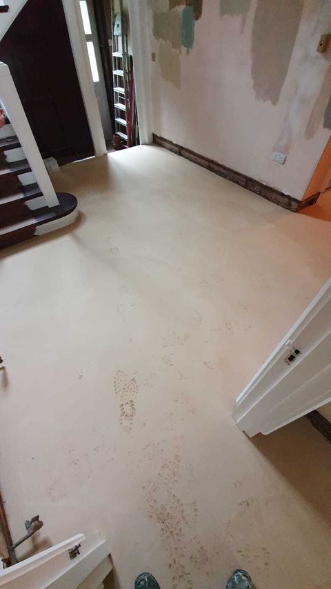 Victorian-style floor tiling laid on the diagonal — finished