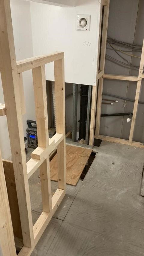 Contemporary apartment bathroom with spa-style storage — before work started