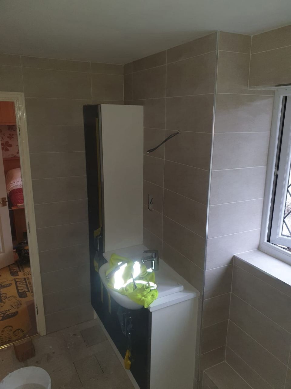tiling around fitted furniture