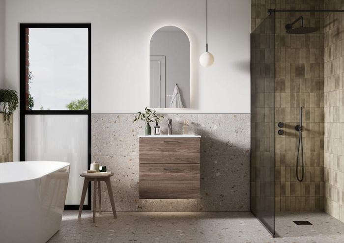Aurelia vanity unit in Sienna Oak with a bath