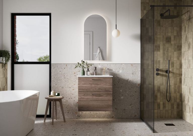 Aurelia vanity unit in Sienna Oak with a bath