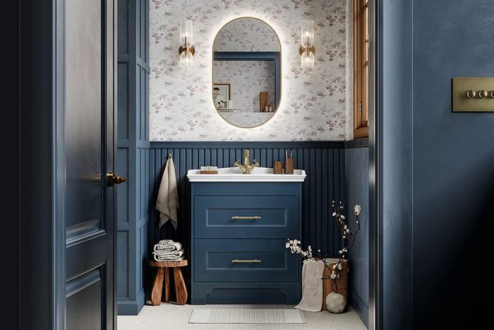 Chelworth vanity in Contour Blue Ash against floral wallpaper