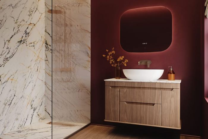 Firova vanity in Persian Walnut with a marble surround