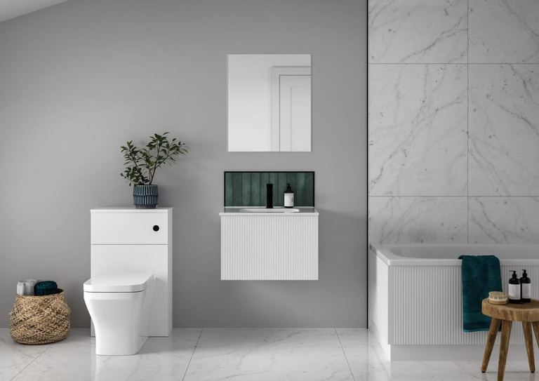 Minori vanity in Opal White with a marble wall