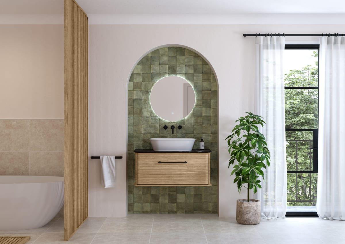 Petra vanity in Tortona Oak in an arched alcove with green tiling