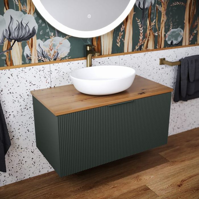 Tesima vanity in Fir Green with a wood worktop and terrazzo floor