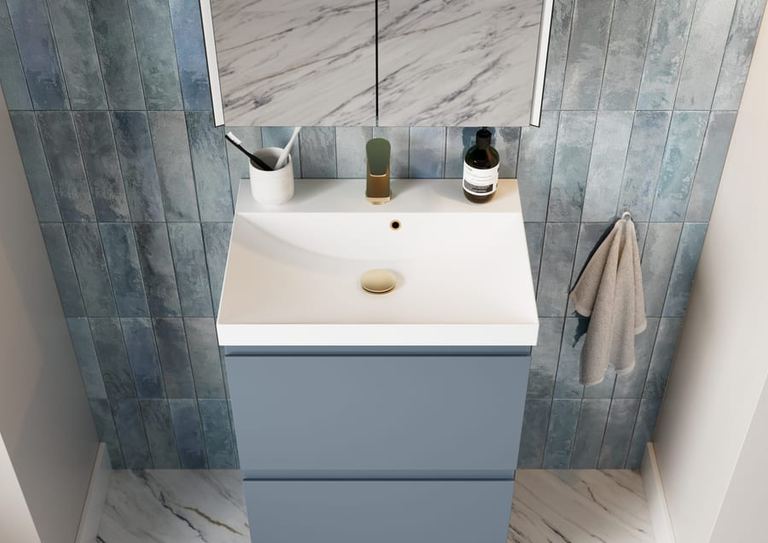Veneto vanity in Lagoon Mist against blue tiling