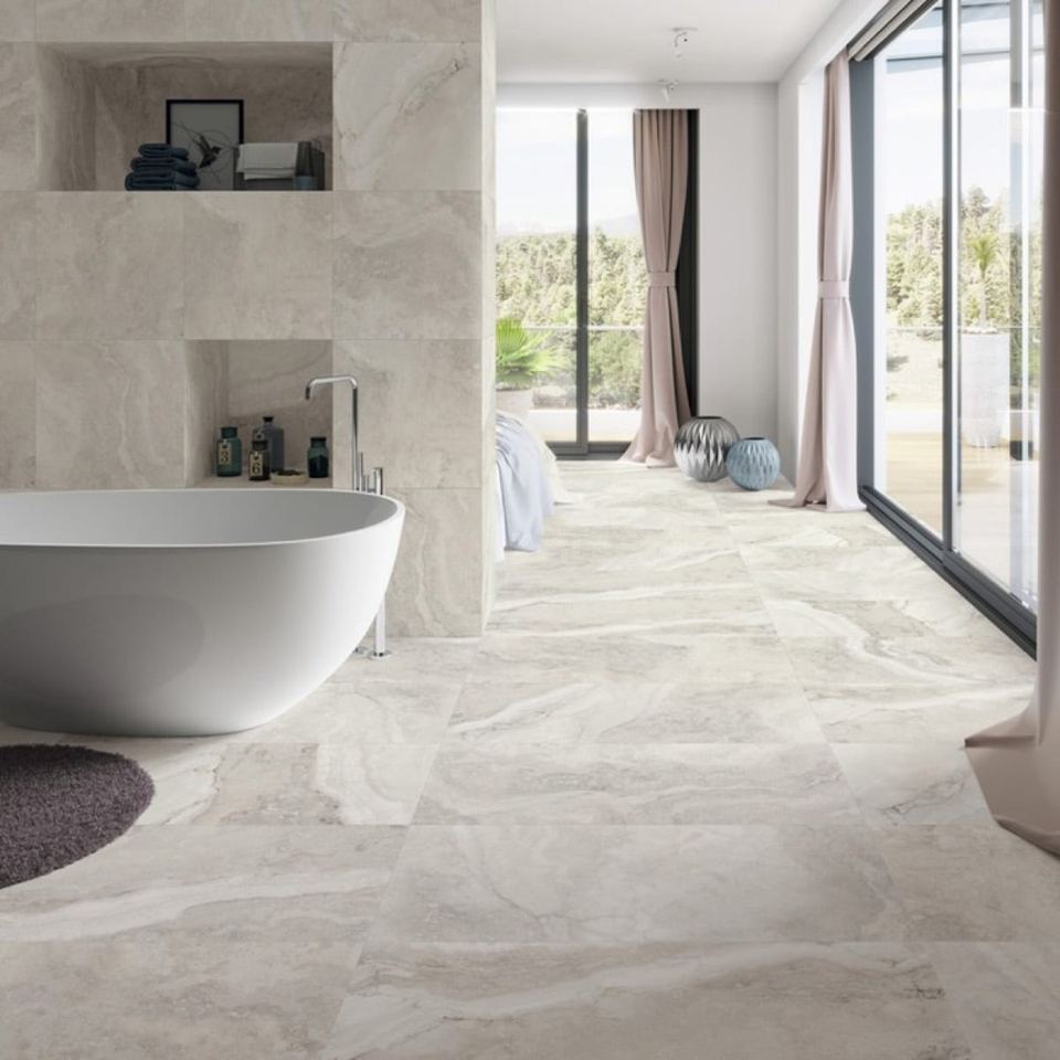 Caracalla Bianco porcelain tiles fitted in a room, marble-effect, matt