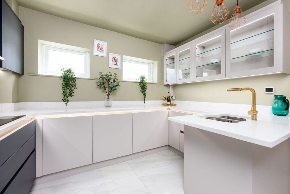 What should you consider when choosing kitchen cabinets for kitchen extensions?