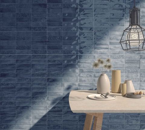 Nexti Ocean ceramic tiles fitted in a room, blue, gloss & polished