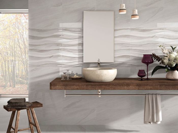 North Perla ceramic tiles fitted in a room, grey, gloss & polished