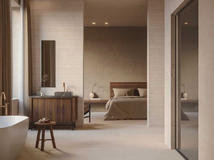 Porcelanosa Coral Caliza porcelain tiles fitted in a room, cream & beige, matt