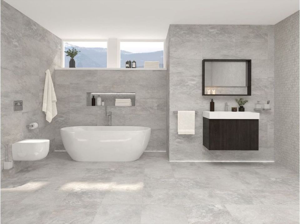 Porcelanosa Image Silver ceramic tiles fitted in a room, grey, gloss & polished