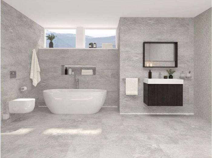 Porcelanosa Image Silver porcelain tiles fitted in a room, grey, gloss & polished