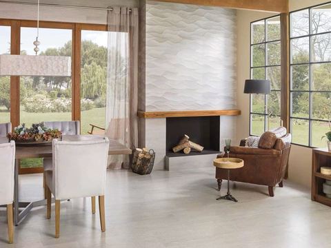 Porcelanosa Madagascar Natural ceramic tiles fitted in a room, grey, matt