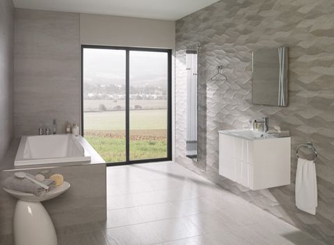 Porcelanosa Madagascar Natural ceramic tiles fitted in a room, grey, matt