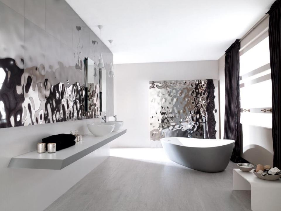 Porcelanosa Madagascar Natural porcelain tiles fitted in a room, grey, matt