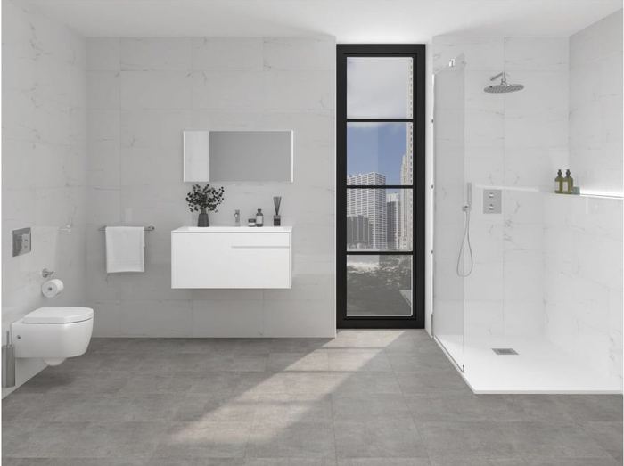Porcelanosa Marmol Carrara Blanco ceramic tiles fitted in a room, marble-effect, gloss & polished