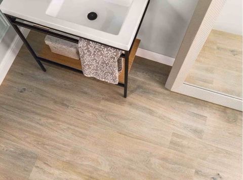 Porcelanosa Smart Tanzania Natural porcelain tiles fitted in a room, wood-effect, matt