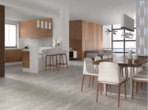 Porcelanosa Smart Tanzania Silver porcelain tiles fitted in a room, wood-effect, matt