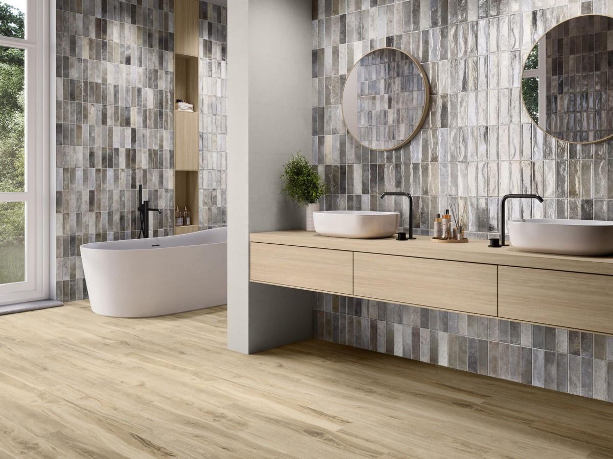 Pre-Artsquare Griege ceramic tiles fitted in a room, grey, gloss & polished