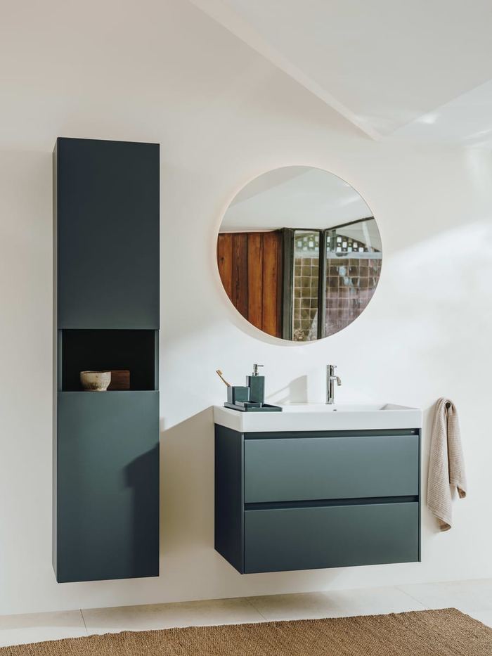 Ona wall-hung unit in Matt Green with a round mirror