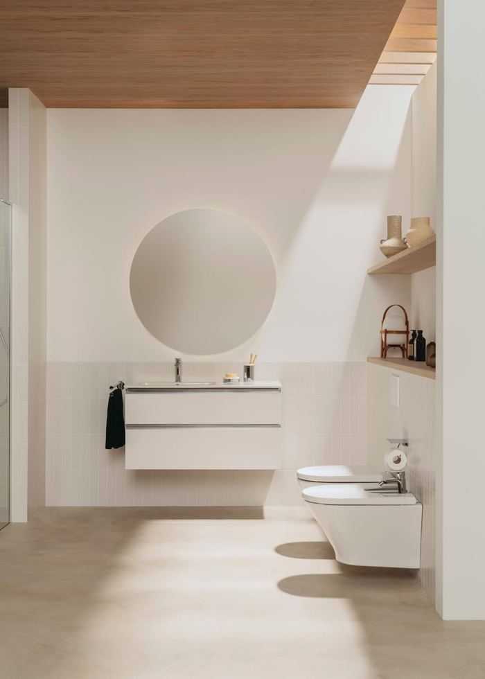The Gap white wall-hung unit with a round mirror and open shelving
