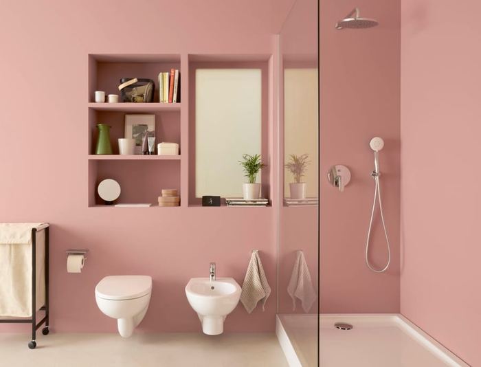 Victoria wall-hung WC and bidet beside a walk-in shower