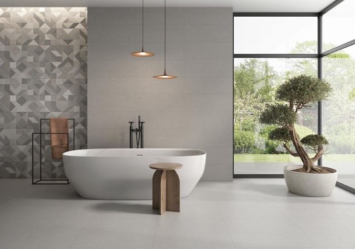 Rodano Perla porcelain tiles fitted in a room, grey, satin