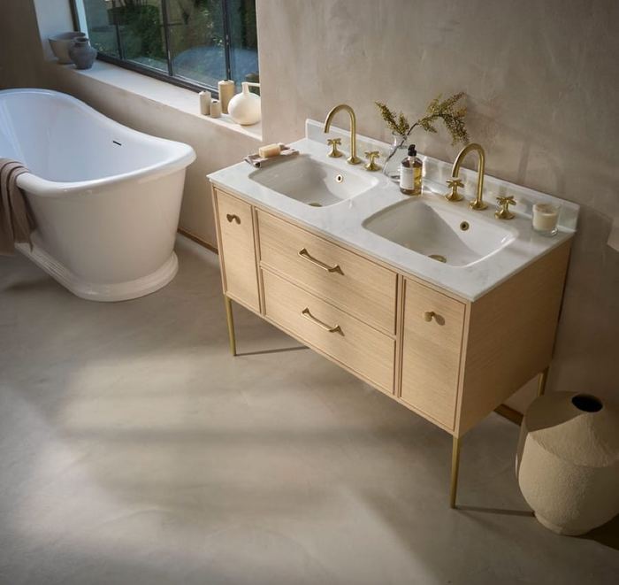 Walcot double basin unit in Light Oak beside a slipper bath