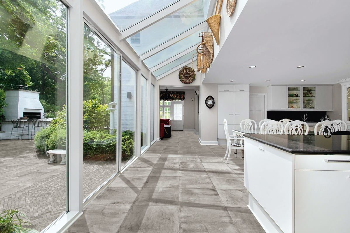 Stoneway Ardesia Grigio porcelain tiles fitted in a room, grey, matt