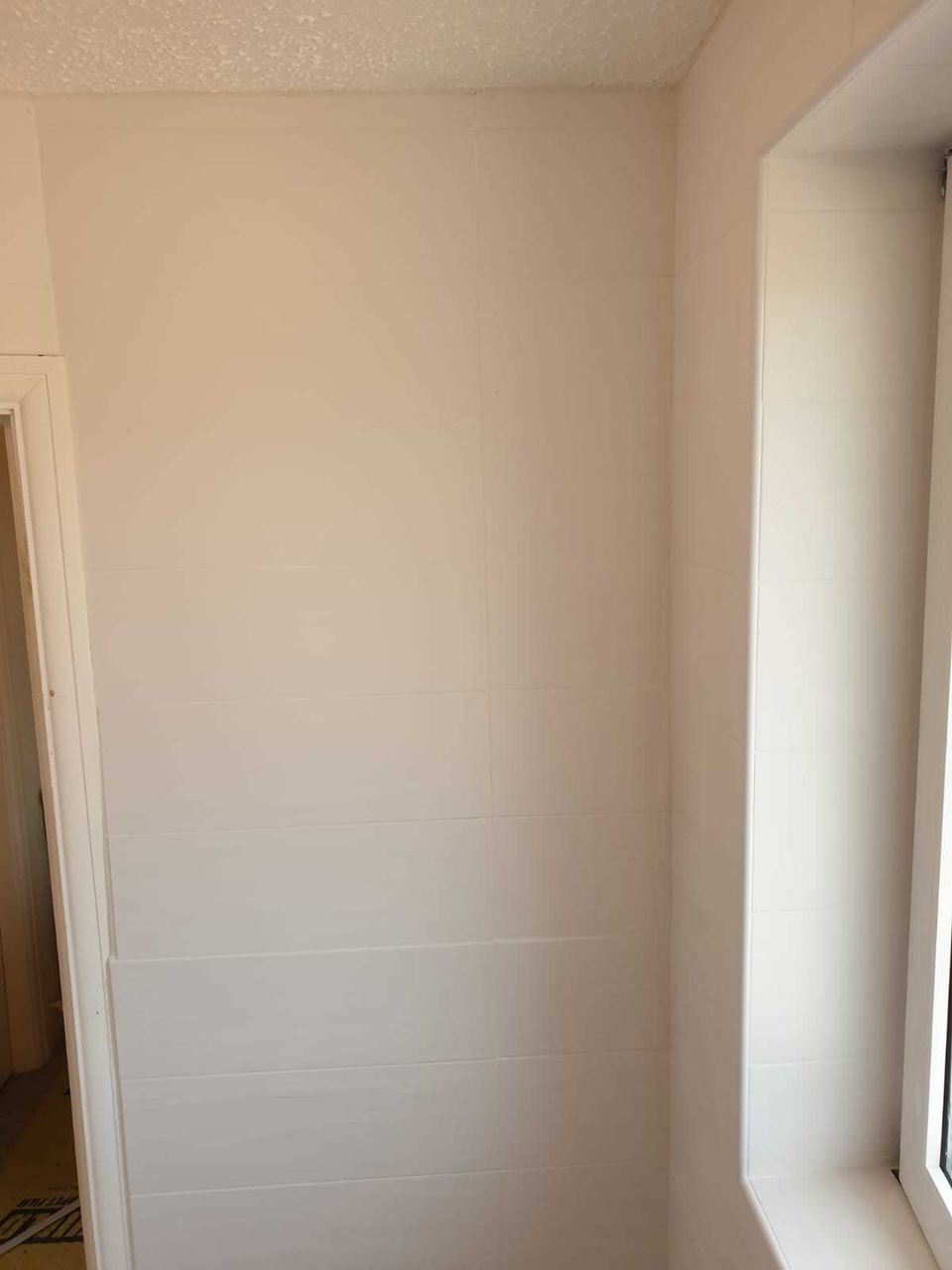 A finished tiled wall
