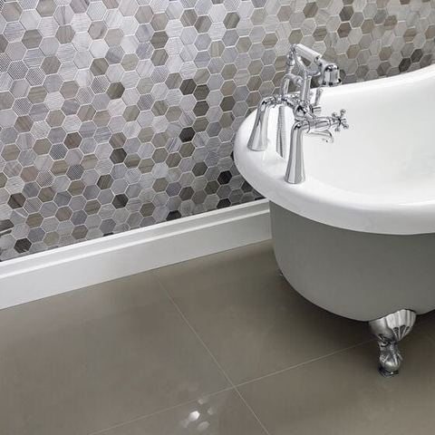 A hexagon mosaic wall and tiled floor fitted in Preston