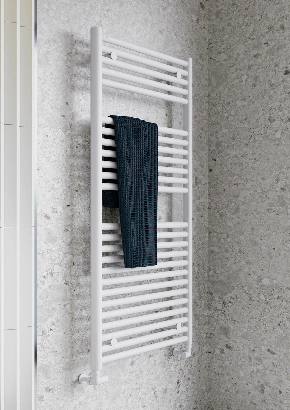 Hugo towel rail in Blanc beside a Mont shower tray