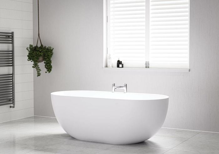 Tanaro freestanding bath with an integrated ledge